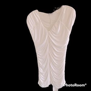 Express top size Medium with ruching.  V-neck design, with stretch.